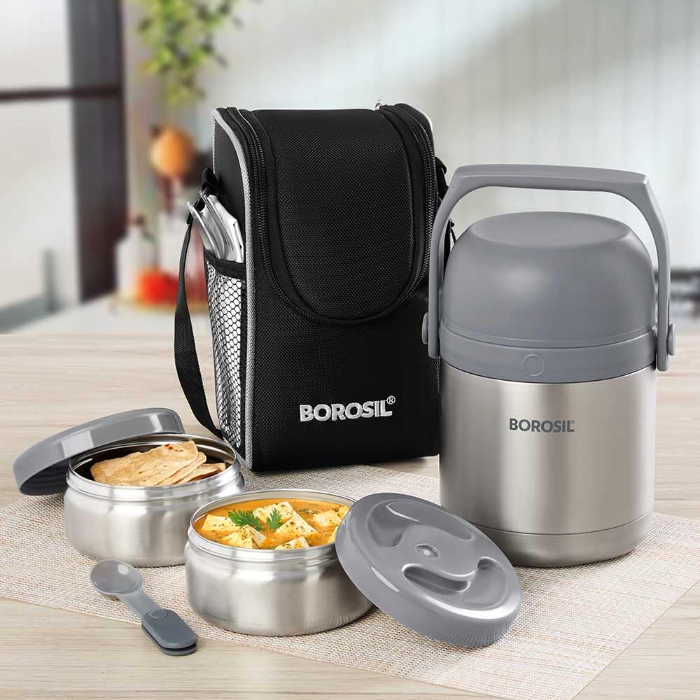 Borosil insulated stainless steel lunch box set with two food containers, carrying bag, and spoon, designed to keep food hot or cold for hours. Ideal for office, school, travel, and everyday meal storage.