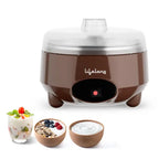 A brown and silver electric yogurt maker with a clear lid, shown on a white background with three bowls of yogurt and fruit garnish in the foreground. The brand name 'lifelong' is printed on the front.