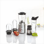 GLEN SA 40484 MF Multi-Function Blender 350W with multiple blending jars, portable sports bottle, and filter attachment, displayed with fresh tomatoes and grapes. Ideal for making smoothies, shakes, juices, sauces, and everyday food preparation.