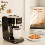 A glossy black Liyelong coffee maker with a white mug on a tabletop, styled in a bright kitchen-like setting with a croissant on a plate and books in the background. Text on the image reads 'Coffee Ready in Minutes' and shows the Liyelong brand.
