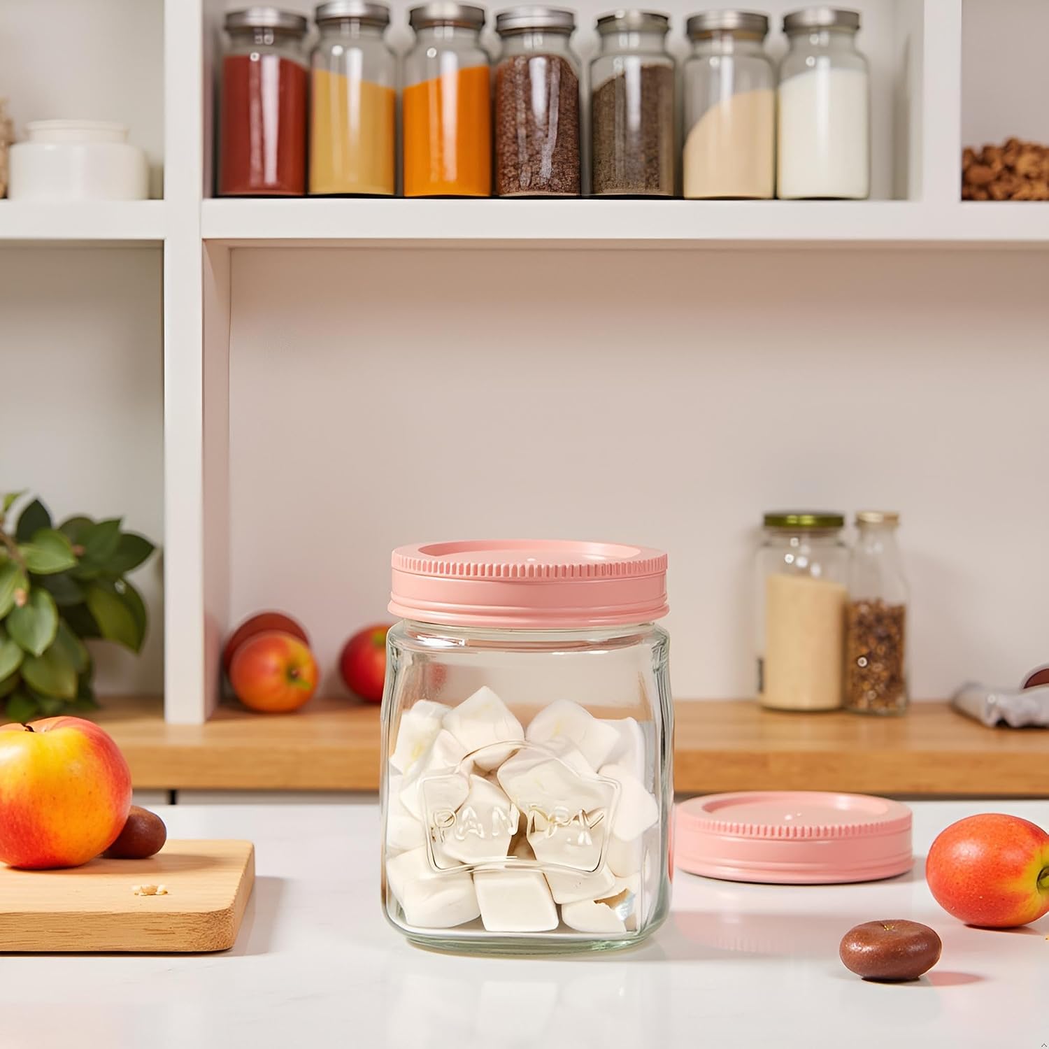 Premium transparent 1500ml glass pantry storage jar with an airtight pink lid, ideal for storing dry fruits, cookies, snacks, spices, coffee beans, honey, pickles, and other kitchen essentials while keeping food fresh and organized.