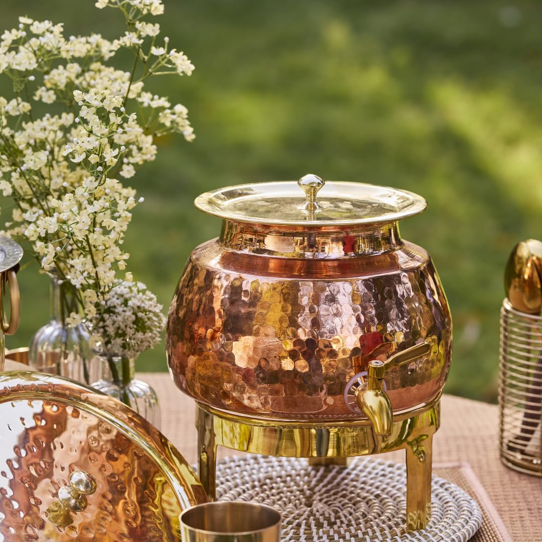 Paras 5L hammered copper water pot with dispensing tap, premium brass lid and brass stand, handcrafted copper water dispenser for storing and serving drinking water at home, office, and meditation centers.