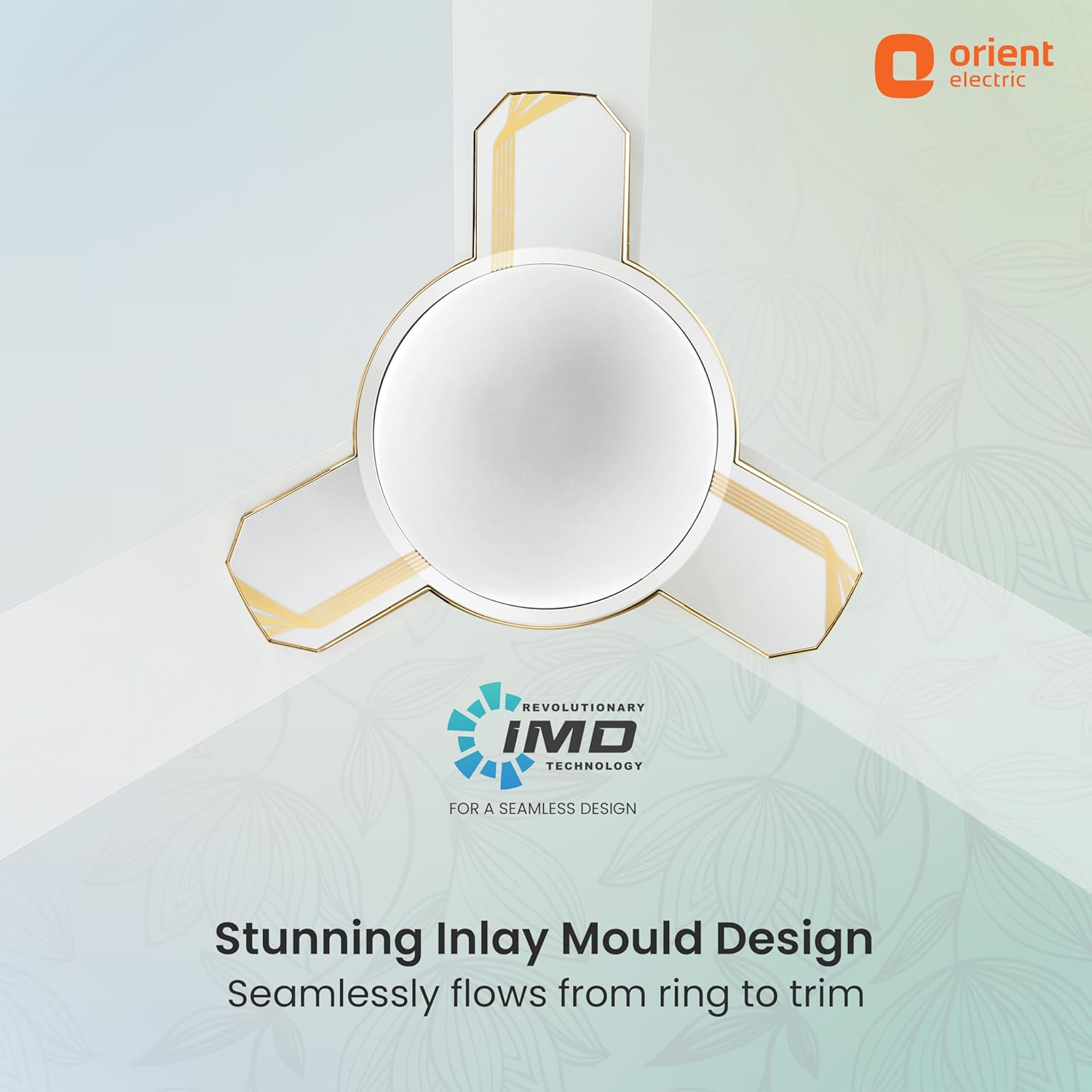 A ceiling fan blade inlay design by Orient Electric, showcasing a seamless white circular inlay with gold trim extending to the three blade tips. The graphic includes branding for Orient Electric and IMD Technology, along with descriptive text about the seamless inlay design.