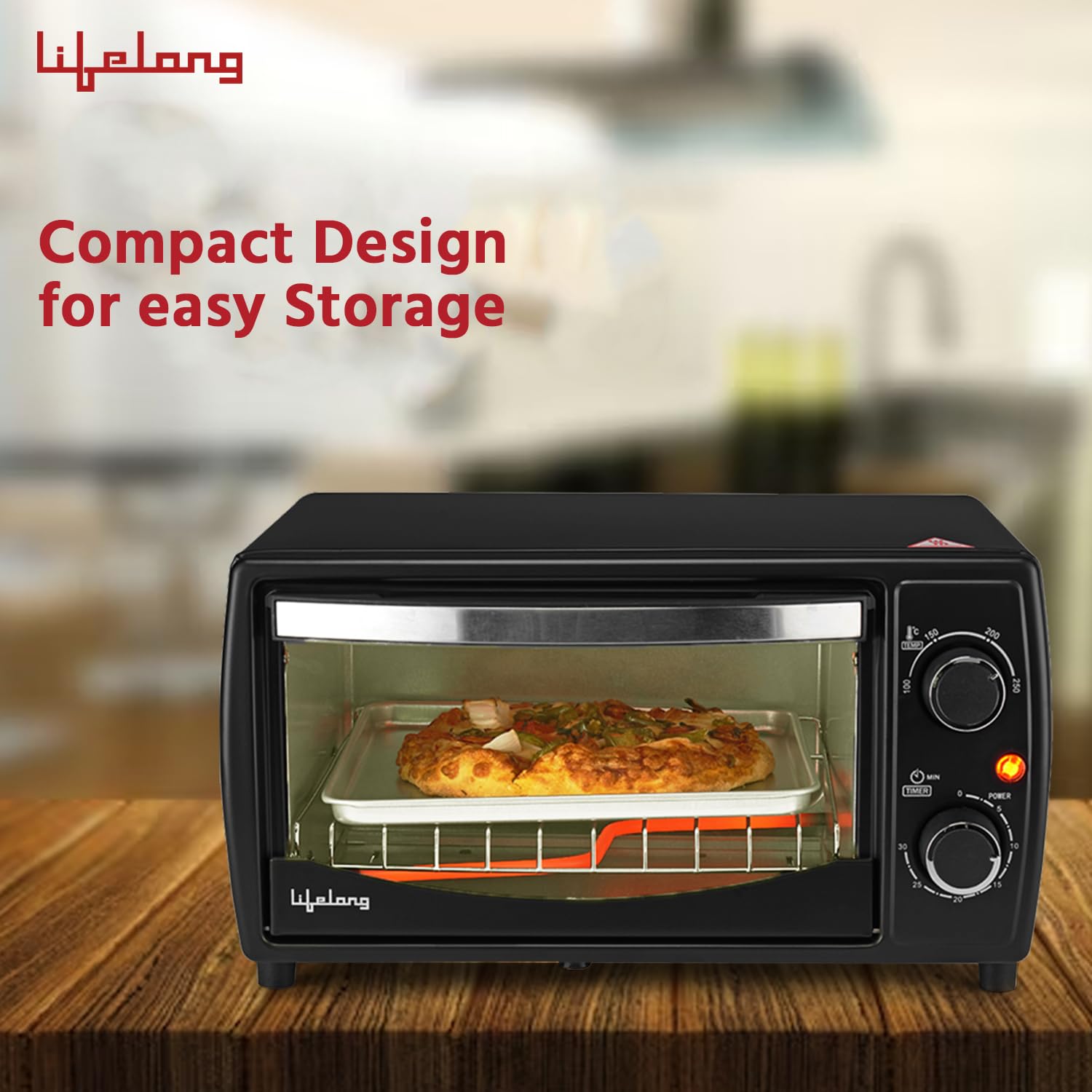 Lifelong LLOT10 10-Litre OTG Oven with a compact black design, adjustable temperature and timer controls, baking a pizza inside. Ideal for baking, grilling, and toasting in small kitchens.