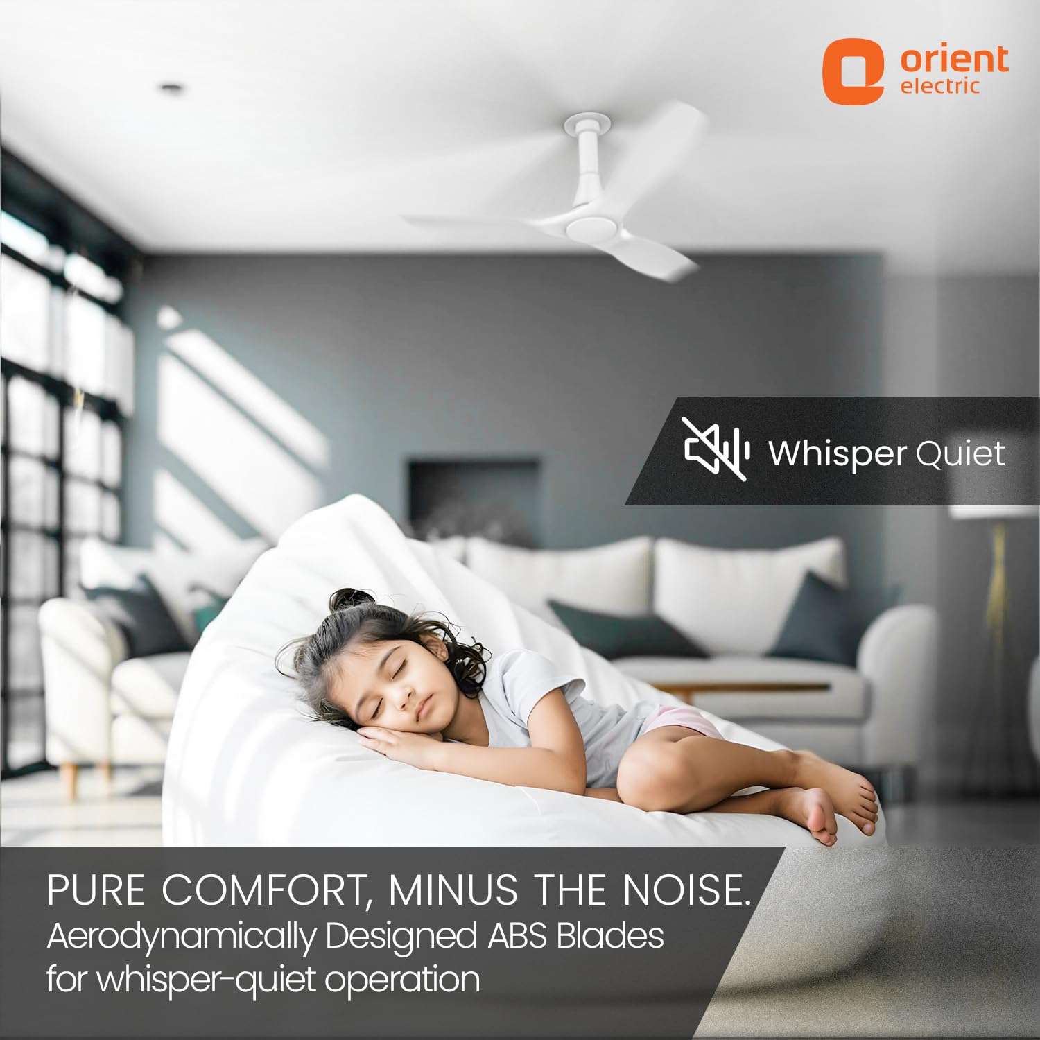Woman sleeping peacefully in a modern living room with an Orient Electric ceiling fan.