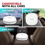Honeywell air purifier shown on car desk, headrest, and armrest with text 'Compatible with all cars'.