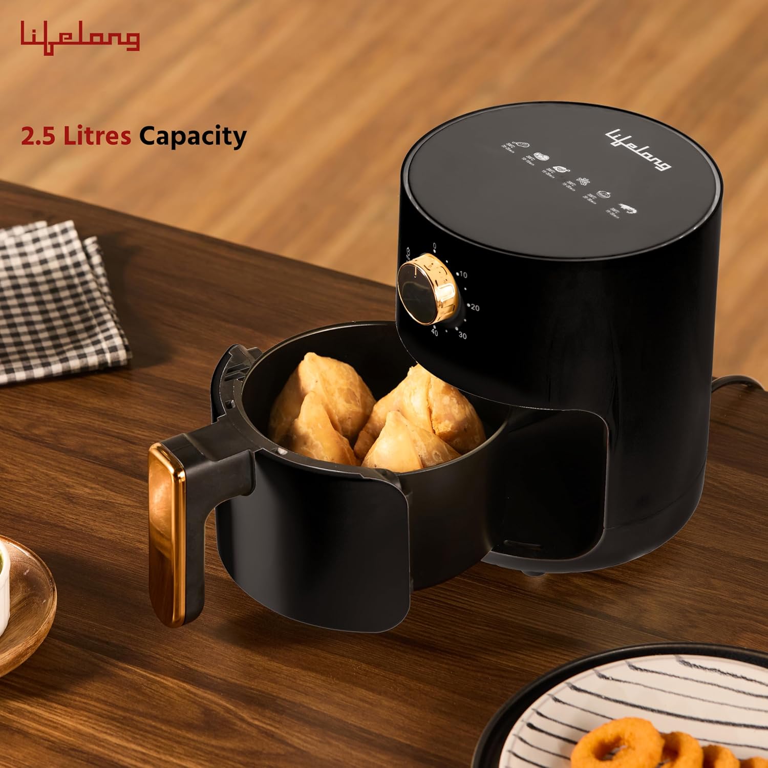 Lifelong 2.5 Litre Digital Air Fryer with a sleek black finish, non-stick frying basket, adjustable temperature and timer control, ideal for preparing crispy samosas, fries, nuggets, vegetables, and other healthy low-oil snacks.