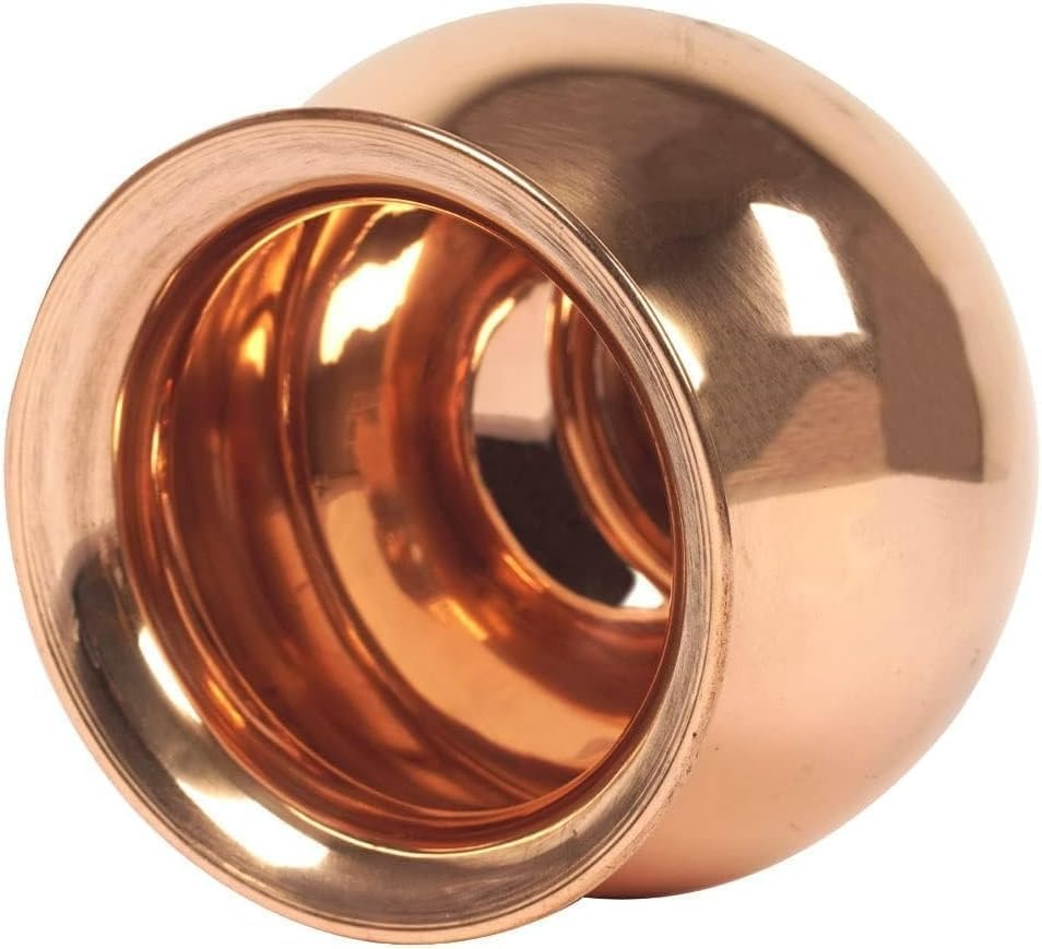 Rose gold metal knob on a white background