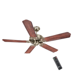 A 5-blade ceiling fan with dark brown wooden blades and an antique brass metal housing, shown with a black remote control on a plain white background.
