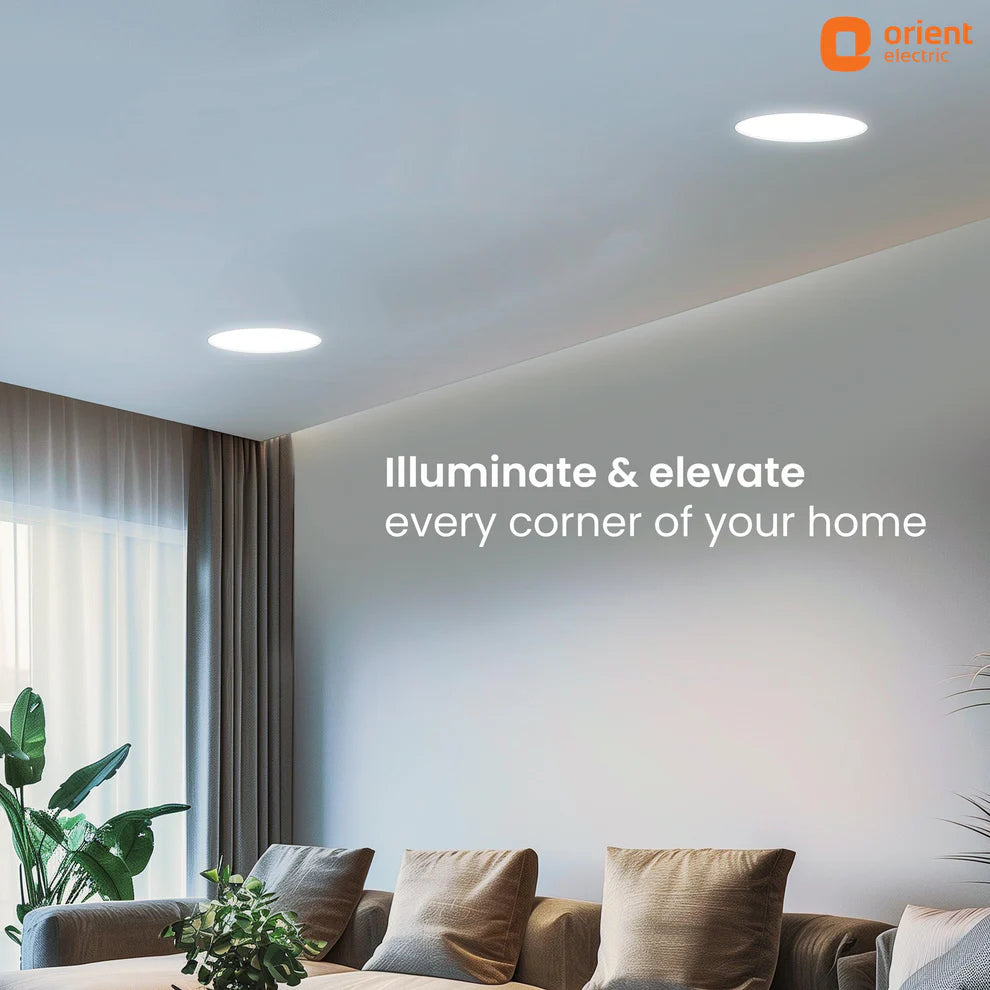 Modern living room with ceiling lights and 'Orient Electric' branding.