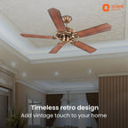 Ceiling fan with wooden blades in a room with decorative ceiling and lighting.