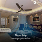 Living room with a ceiling fan, featuring Orient Electric branding.