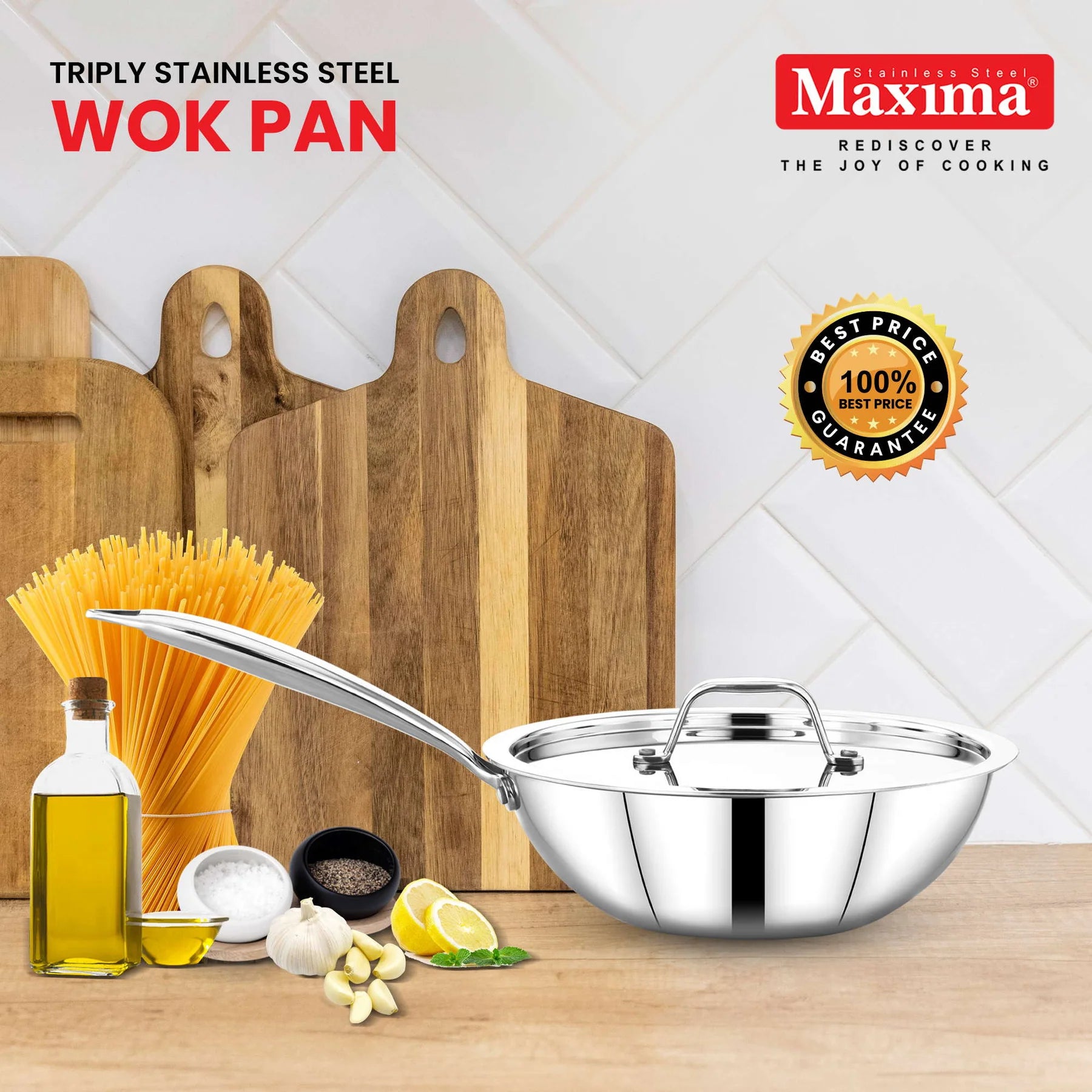 Maxima Triply Stainless Steel Wok Pan with lid and long ergonomic handle, displayed on a modern kitchen countertop beside a plate of pasta. Premium tri-ply stainless steel cookware designed for even heat distribution, healthy cooking, and compatibility with gas, induction, and other cooktops.
