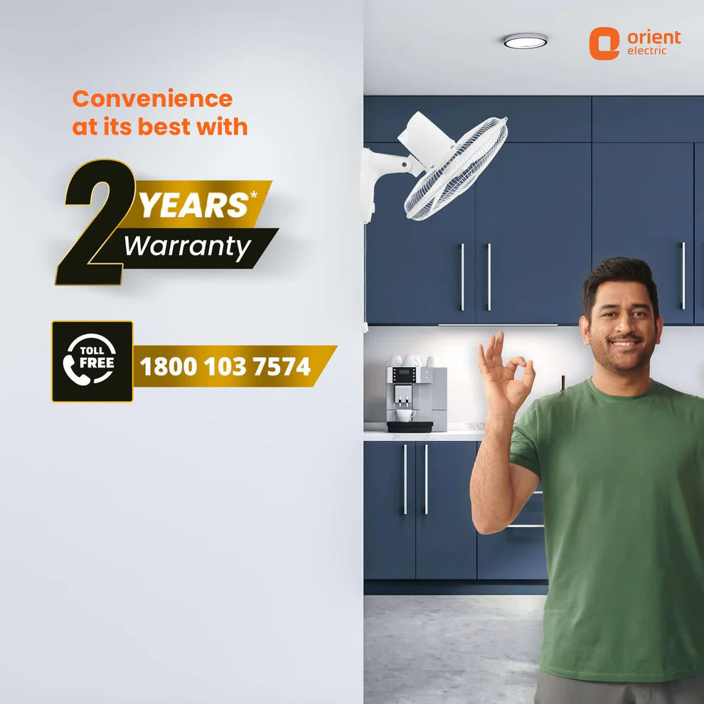 Advertisement for Orient Electric with a man in a kitchen and warranty information.