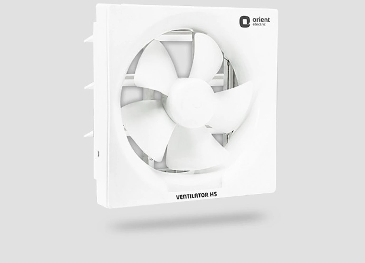 A white glass-mounted exhaust fan with a five-blade fan inside a square housing, shown floating against a light gray background. The brand 'orient' is visible in the top right corner of the housing, and 'VENTILATOR HS' is printed at the bottom.